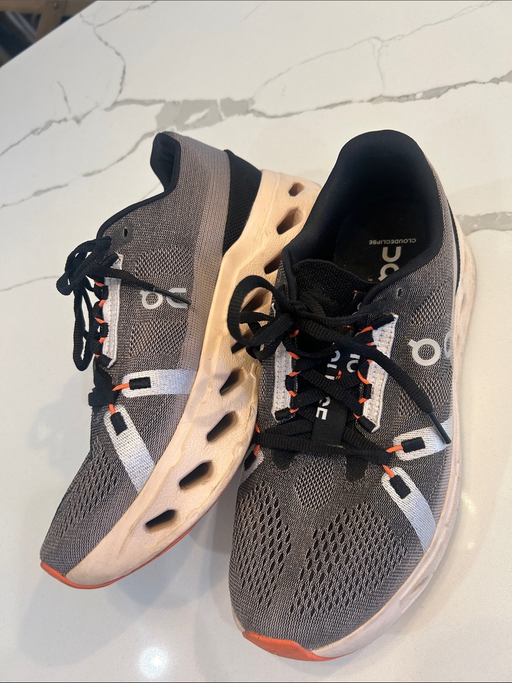 On Running Gray and Black Women's Running Sneakers with Orange Accents - Picture 2 of 6